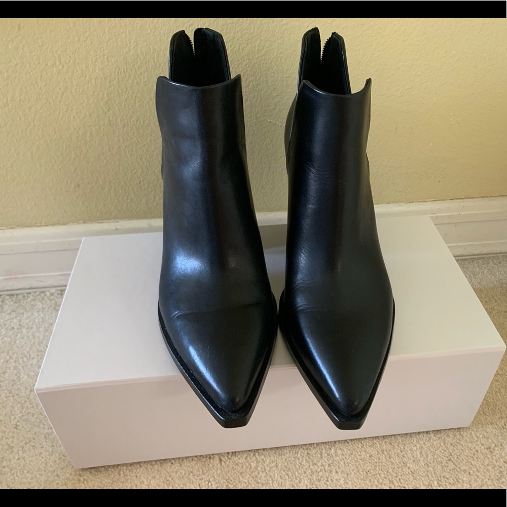 Vince Camuto booties. Size 9. Color black. New.